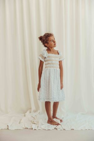 the organic cotton Smocked Striped Dress by the brand LiiLU