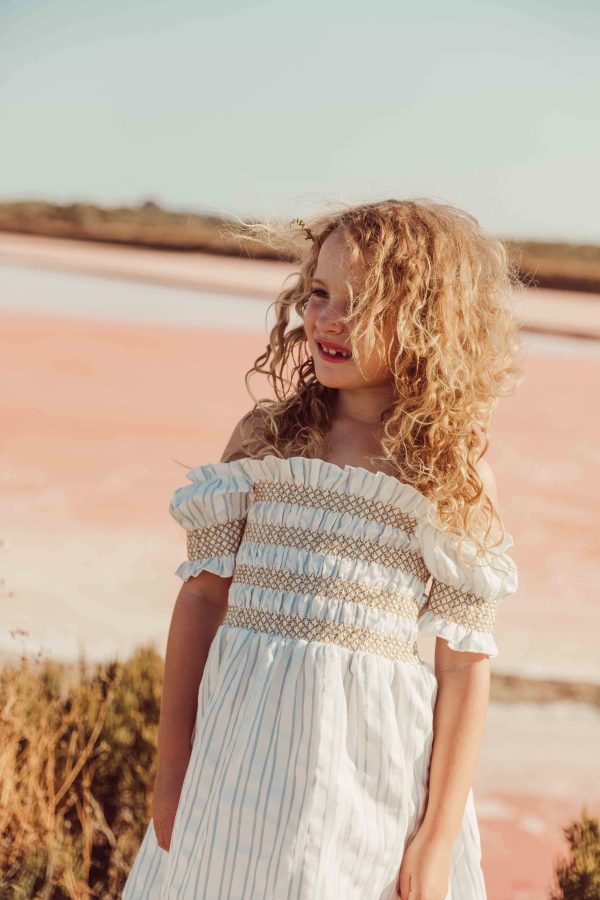 the organic cotton Smocked Striped Dress by the brand LiiLU