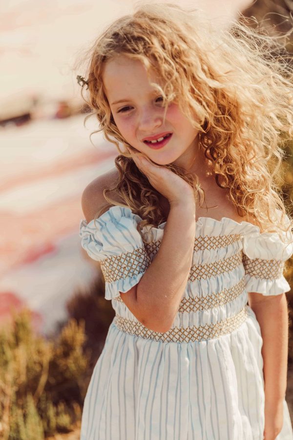 the organic cotton Smocked Striped Dress by the brand LiiLU