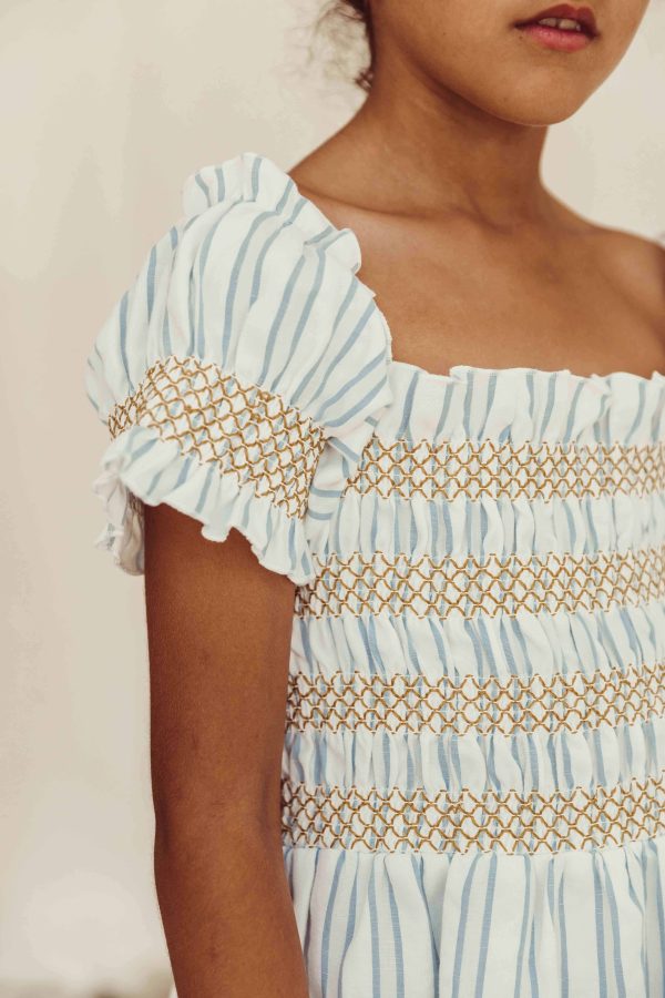 the organic cotton Smocked Striped Dress by the brand LiiLU