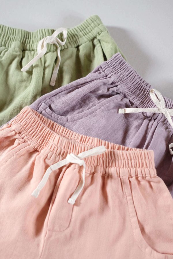 the organic cotton Tudor Shorts in dryed green, lavender & peach by the brand LiiLU