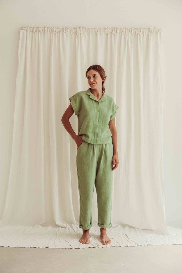 the organic cotton Mateo Shirt in Dryed Green paired with the matching Levi Pants by the brand LiiLU