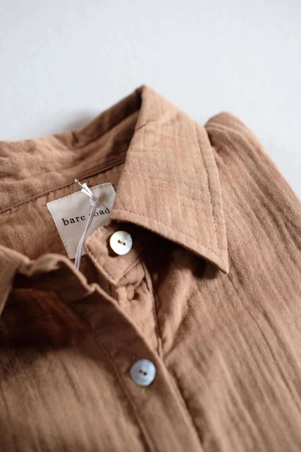 the Paige Shirt in Chocolate by the brand The Bare Road