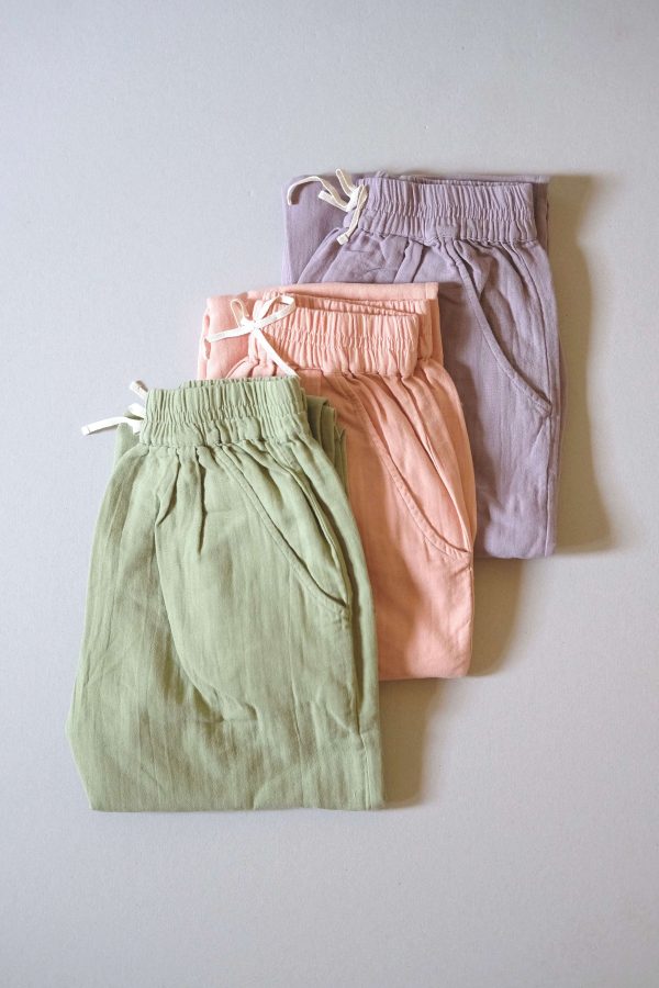 the organic cotton Levi Pants in Dryed Green, Peach & Lavender by the brand LiiLU
