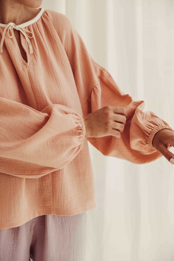 the organic cotton Lili Blouse in Peach by the brand LiiLU