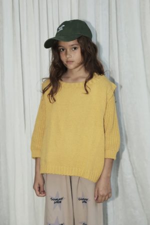 the oversized knitted vest in Yellow by the brand Summer and Storm