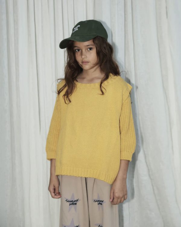 the oversized knitted vest in Yellow by the brand Summer and Storm