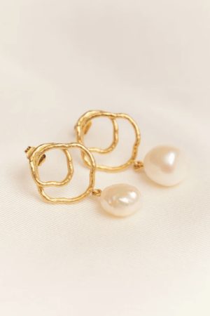 the golden & pearl Célaphine Earrings by the brand Agapé Studio