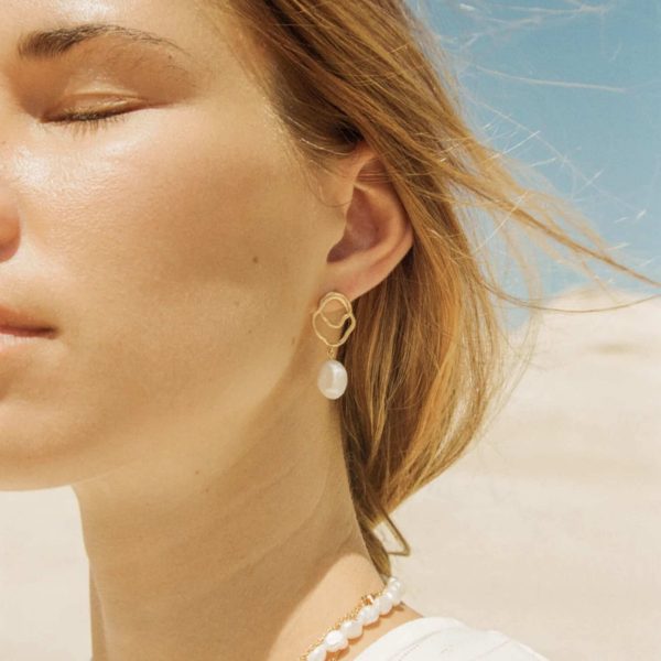 the golden & pearl Célaphine Earrings by the brand Agapé Studio