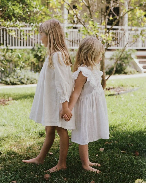 The Briar Dress in White Cotton & the Eadie Smock in Shell Linen by the brand Daughter, curated by Morsel Store