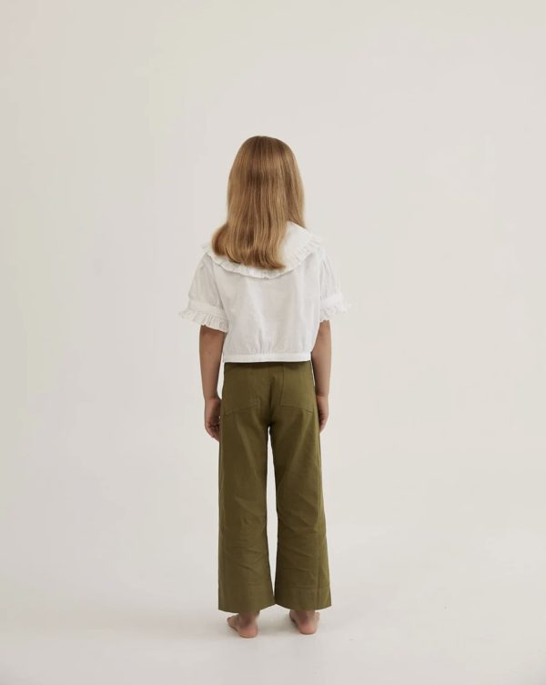 the Honey Blouse in White & the Molly Trousers in Olive by the brand Daughter, curated by Morsel Store