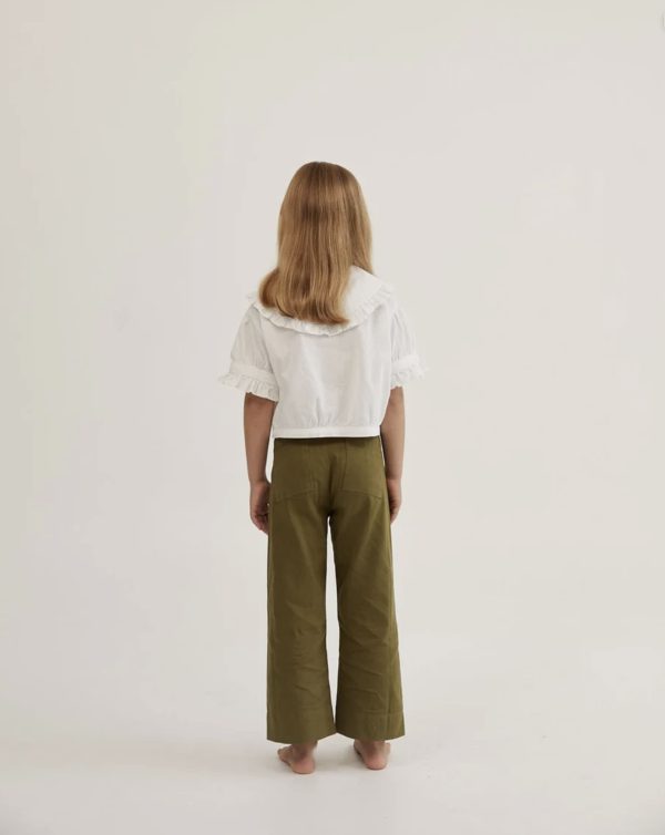 the Molly Trousers in Olive & Honey Blouse in White by the brand Daughter, curated by Morsel Store