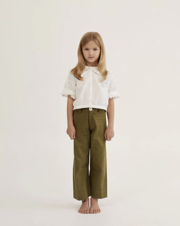 the Molly Trousers in Olive & Honey Blouse in White by the brand Daughter, curated by Morsel Store
