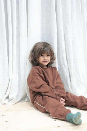 the track suit set in Brown by the Australian brand Summer and Storm, curated by Morsel Store