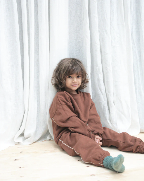 the track suit set in Brown by the Australian brand Summer and Storm, curated by Morsel Store