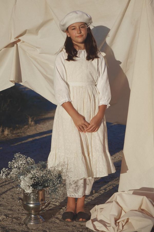 the Fiona Pinafore Dress in Creme Broderie by the brand House of Paloma, curated by Morsel Store