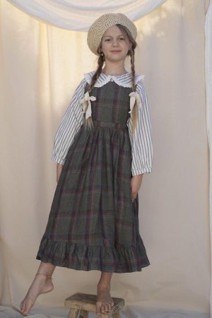 the Juliette Pinafore in Olive Plaid Linen by the brand House of Paloma, curated by Morsel Store