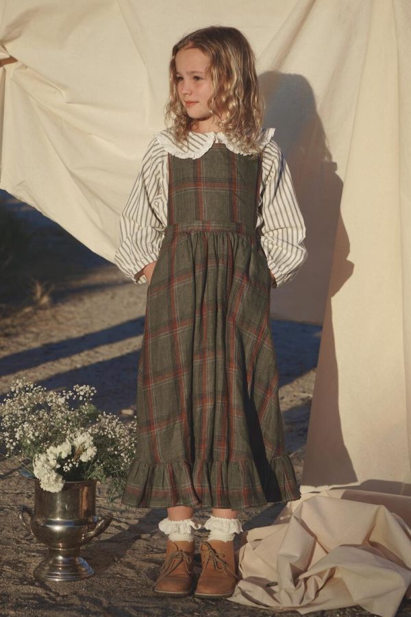 the Juliette Pinafore in Olive Plaid Linen by the brand House of Paloma, curated by Morsel Store
