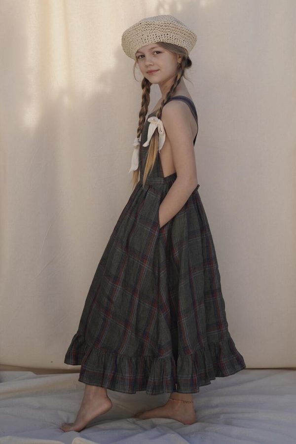 the Juliette Pinafore in Olive Plaid Linen by the brand House of Paloma, curated by Morsel Store
