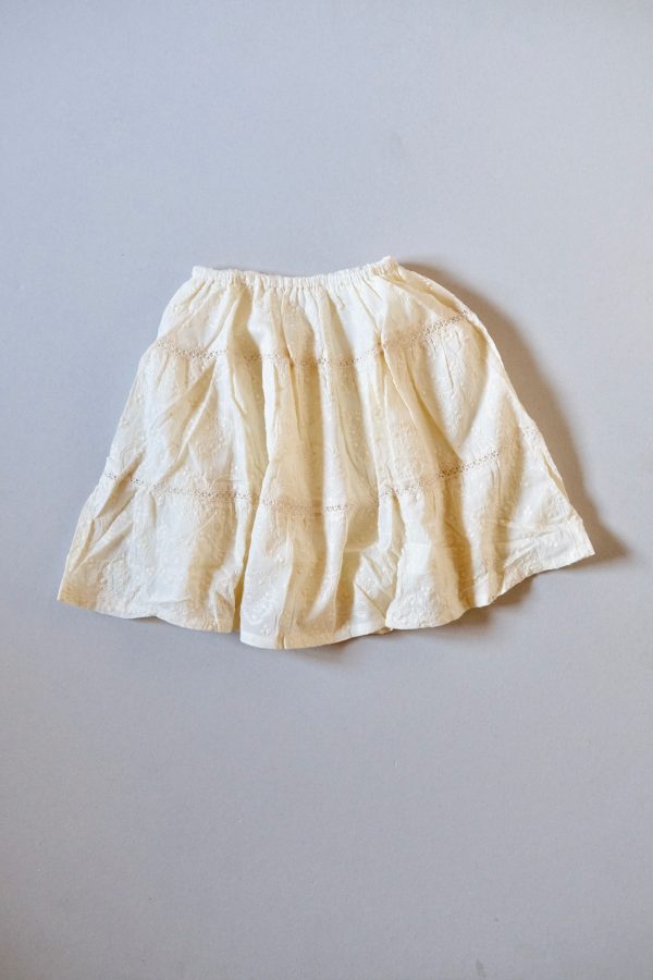 flatlay of the Baia Skirt in cotton Creme Broderie by the Australian brand House of Paloma, curated by Morsel Store