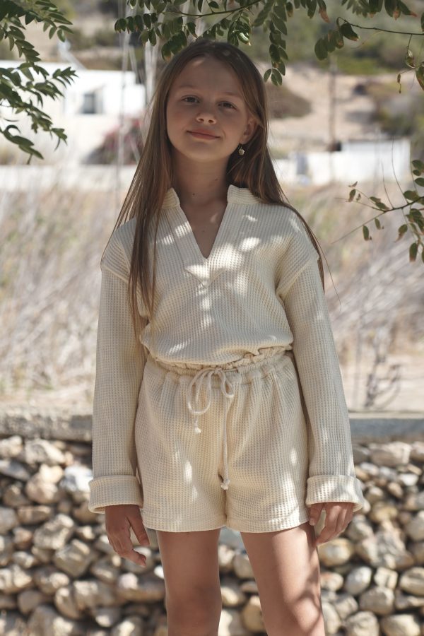 girl wearing the Bruno Short in cotton Vanilla Waffle fabric paired with the matching Jule Tunic by the Australian brand House of Paloma, curated by Morsel Store