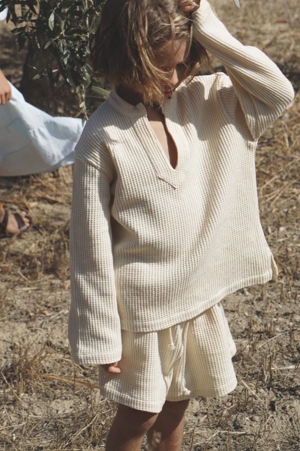 boy wearing the Bruno Short in cotton Vanilla Waffle fabric paired with the matching Jule Tunic by the Australian brand House of Paloma, curated by Morsel Store