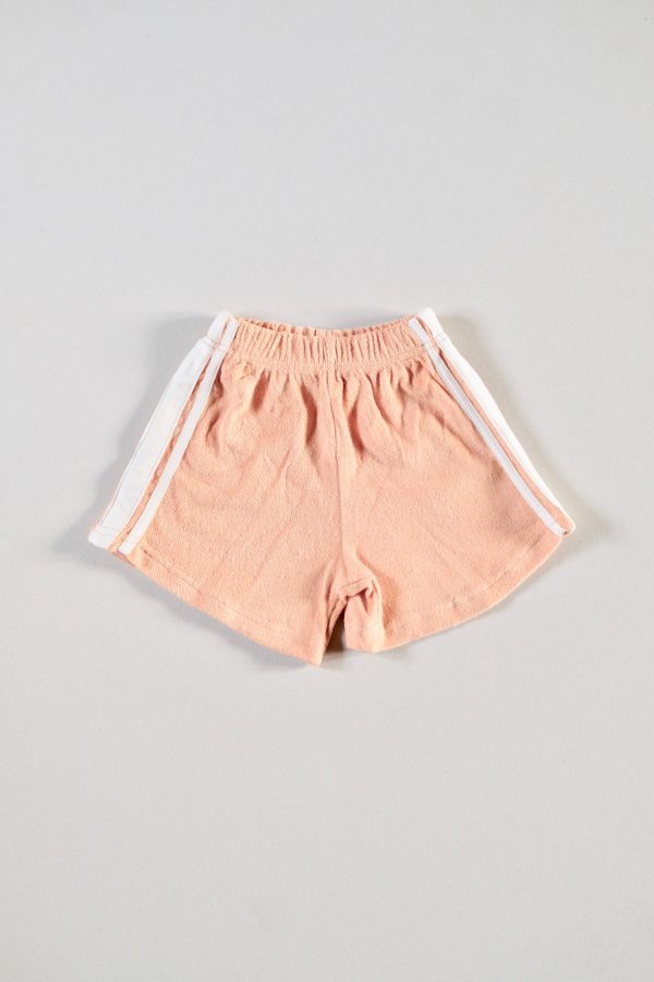 the Racer Terry Shorts in Peach by the brand Summer and Storm, curated by Morsel Store