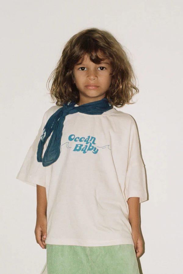 boy wearing the Oversized Tee in Ocean Baby paired with the Racer Terry Pants by the brand Summer and Storm, curated by Morsel Store