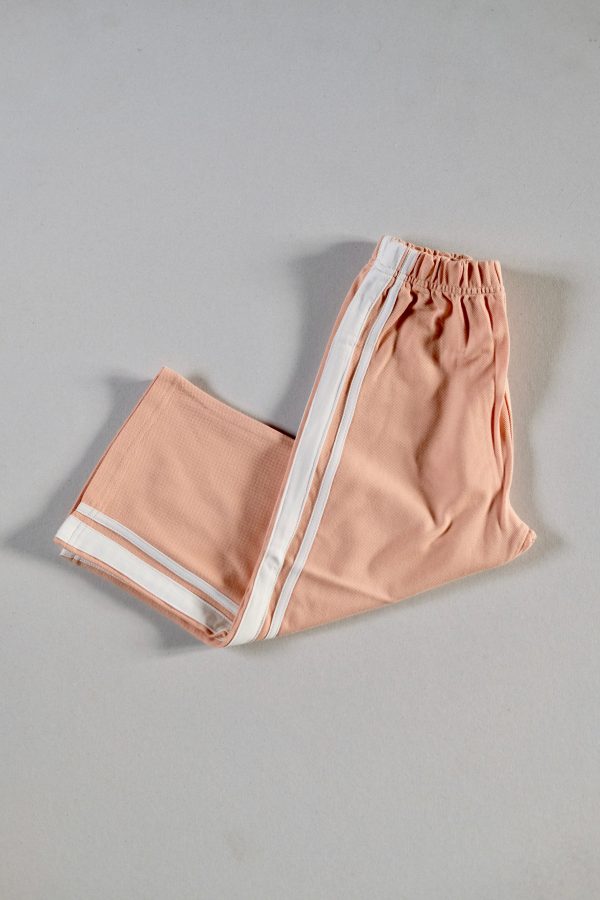 the Racer Pants in Peach by the brand Summer and Storm, curated by Morsel Store