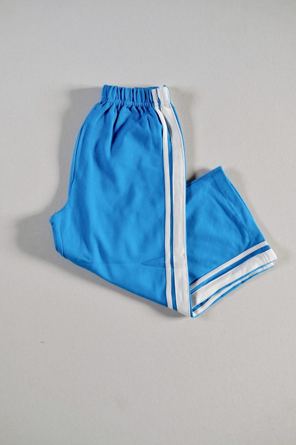 the Racer Pants in Sonic Blue by the brand Summer and Storm, curated by Morsel Store