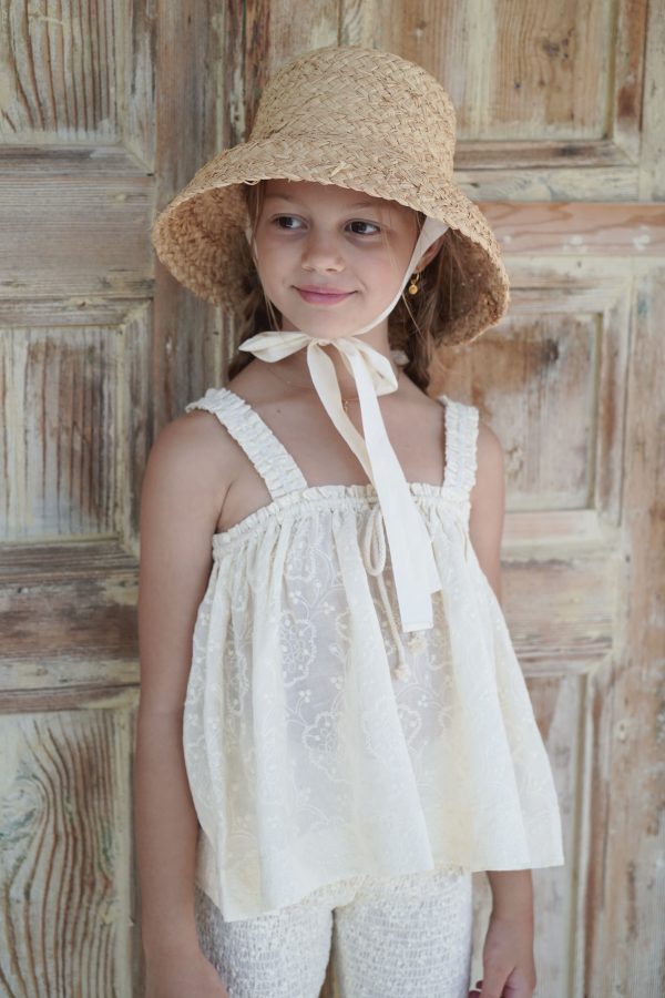 the cotton Edith Top in Creme Broderie paired with the matching Zadie Pants and Jean Belle Raffia Hat by the sustainable brand House of Paloma, curated by Morsel Store