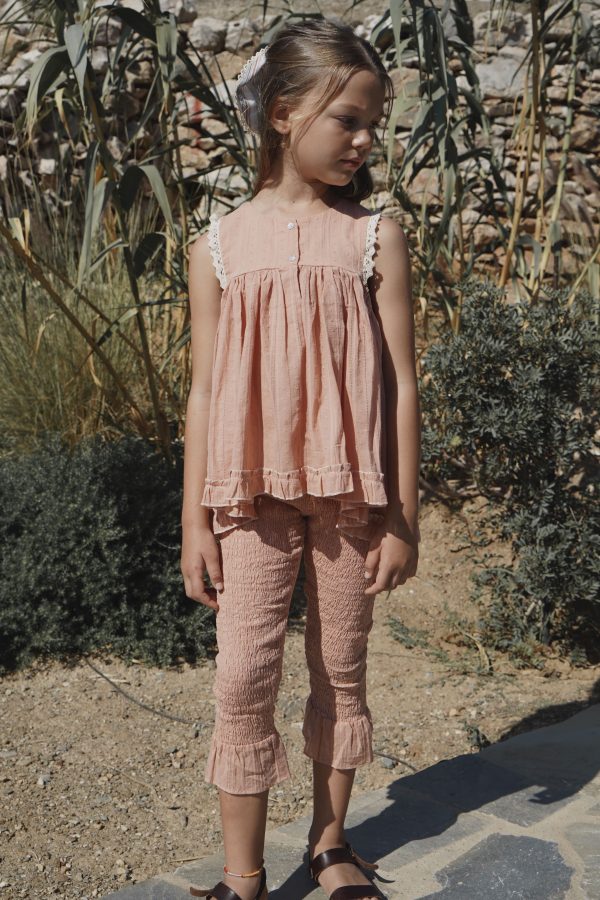 girl wearing the Zadie Pant & matching Bijou Top in Antique Coral Broderie by the sustainable brand House of Paloma, curated by Morsel Store