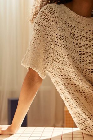 the crochet Vasara Dress in Sea Salt by the brand The Knotty Ones, curated by Morsel Store