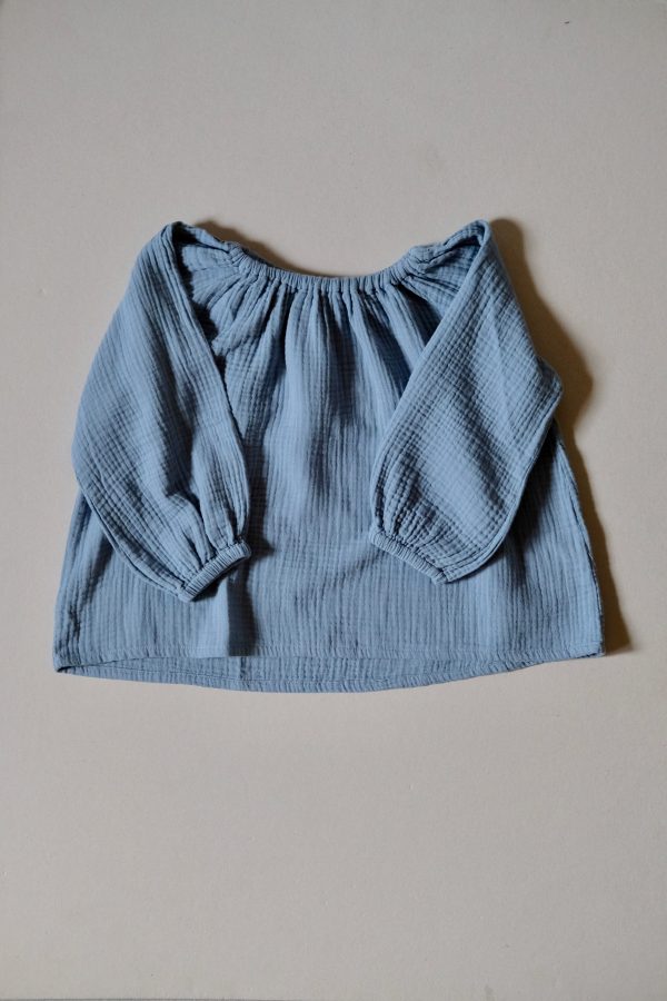 the Liilu Blouse in Storm Blue organic muslin cotton by the sustainable brand LiiLU, curated by Morsel Store located on Mallorca