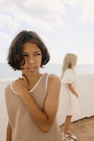 boy wearing the Bobo Top in Chestnut Organic Cotton by the sustainable brand Liilu, curated by Morsel Store, located on Mallorca