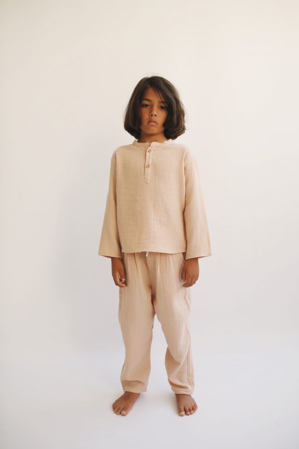 boy wearing the Leonard Shirt in Nude organic muslin cotton paired with the Levi Pant by the sustainable brand LiiLU, curated by Morsel Store located on Mallorca