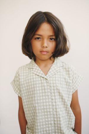 boy wearing the Mateo Shirt in Tea organic cotton by the sustainable brand LiiLU, curated by Morsel Store, located on Mallorca