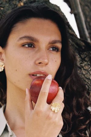 woman wearing the gold Adonis Ring by the sustainable brand Agapé Studio, curated by Morsel Store