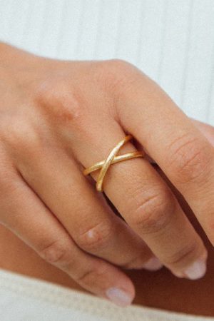woman wearing the Alta Ring in gold by the sustainable jewellery brand Agapé Studio, curated by Morsel Store