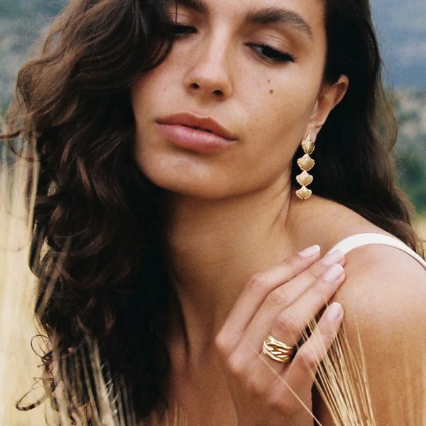 woman wearing the Lina Ring in gold by the sustainable jewelry brand Agapé Studio, curated by Morsel Store