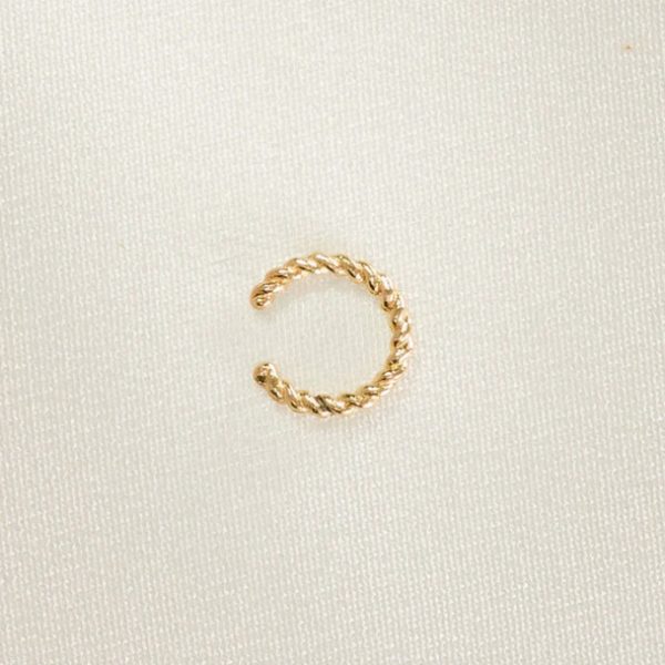 the Mirada Earcuff in gold by the sustainable jewelry brand Agapé Studio, curated by Morsel Store