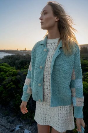 woman wearing the cotton Prietema Crochet Jacket in Fantasy Dew & Vasara Dress by the sustainable brand The Knotty Ones, curated by Morsel Store