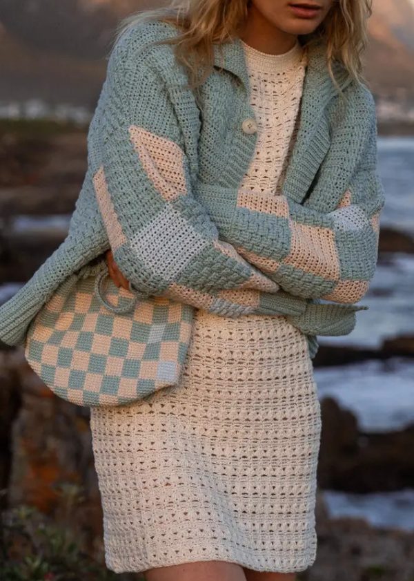 woman wearing the cotton Prietema Crochet Jacket in Fantasy Dew & Vasara Dress by the sustainable brand The Knotty Ones, curated by Morsel Store