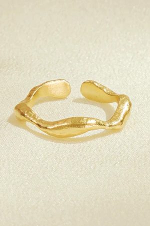 the Satis Ring in gold by the sustainable jewelry brand Agapé Studio (now Agapée), curated by Morsel Store