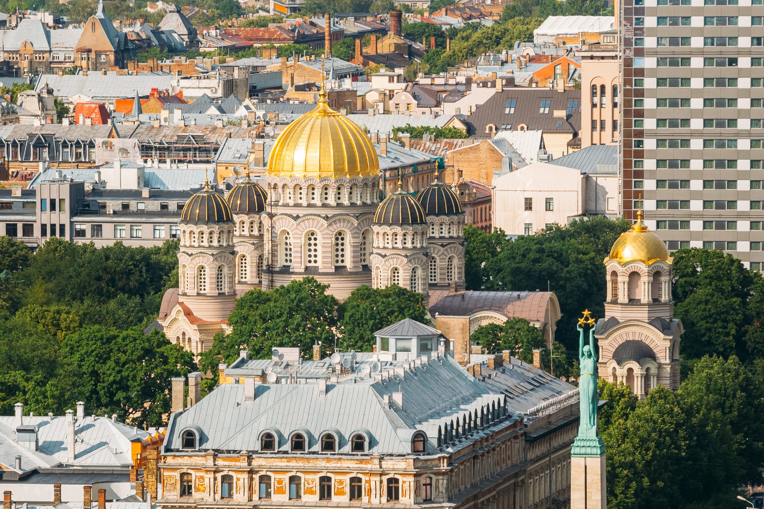 Riga, Latvia. Cityscape In Sunny Summer Day. Top View Of Famous