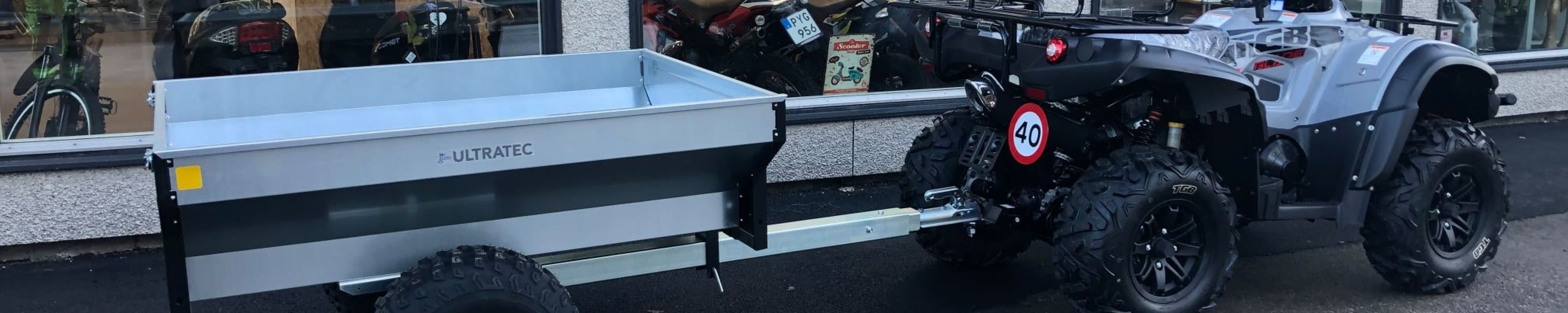 Motorshopen fyrhjuling med kärra