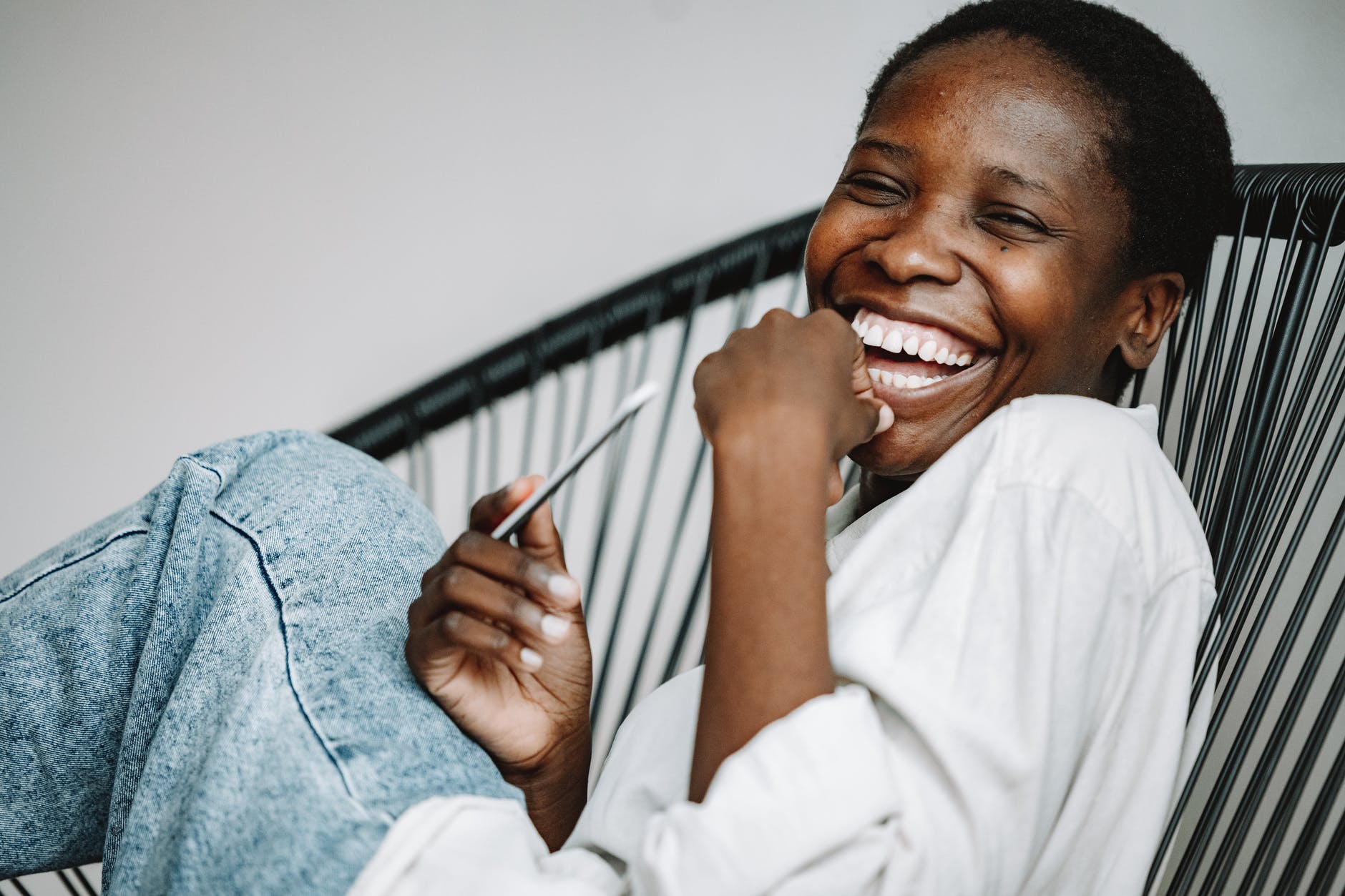 close up photo of a woman laughing