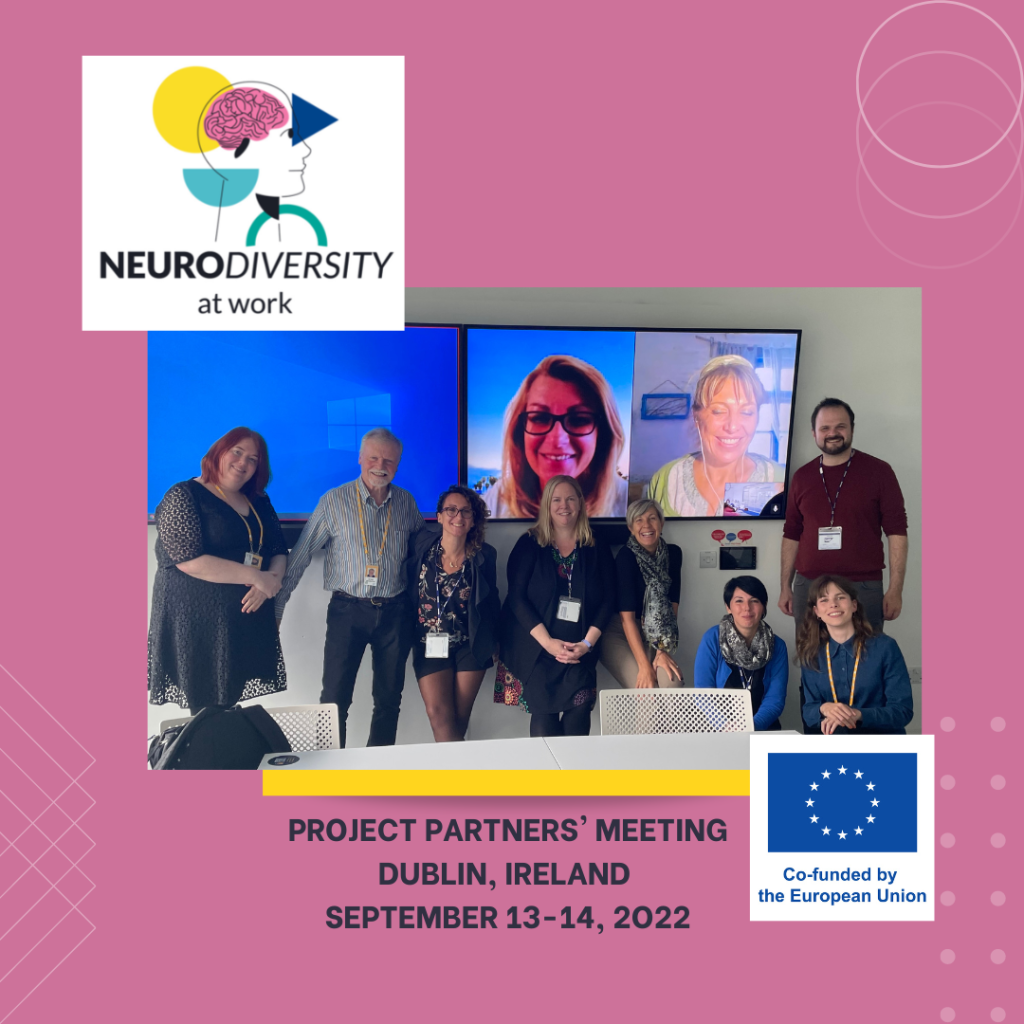 Participants at the Neurodiversity at Work project partner's meeting in Dublin September 13-14, 2023. Includes those attending in person standing in front of a screen showing those who attended online.