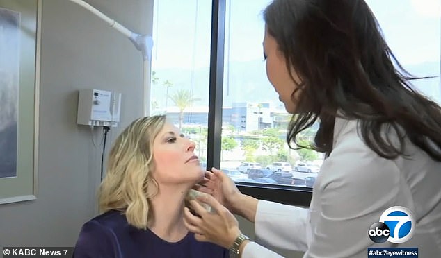 She was diagnosed with squamous cell carcinoma, a skin cancer that occurs in cells in the skin's outermost layer. Pictured: French being examined by her dermatologist