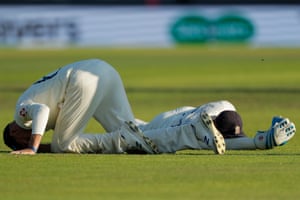 Joe Root and Jonny Bairstow lie in a heap after another dropped catch off the bowling of Ben Stokes.